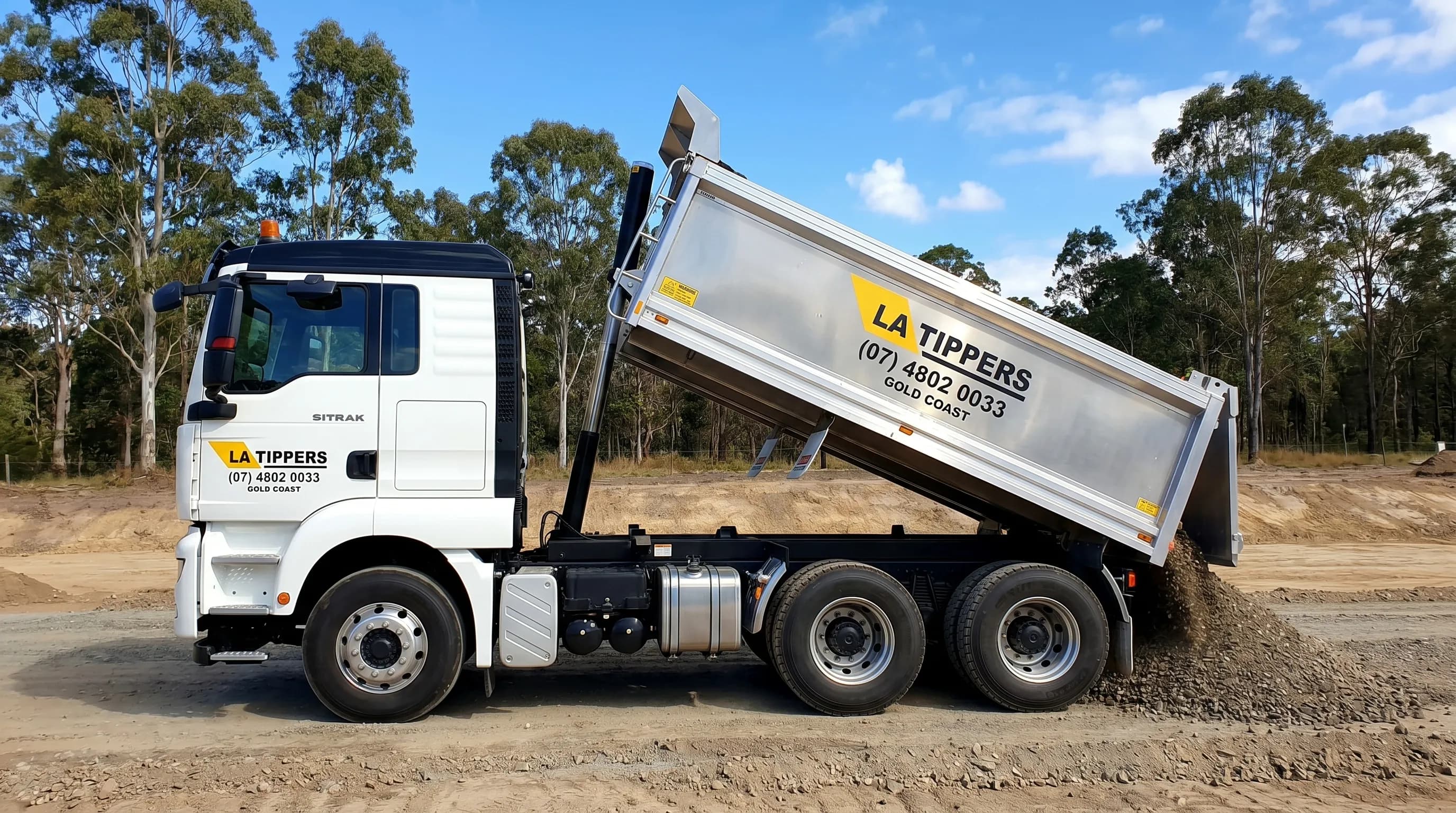 Tipper truck delivering bulk road base to a Gold Coast civil site