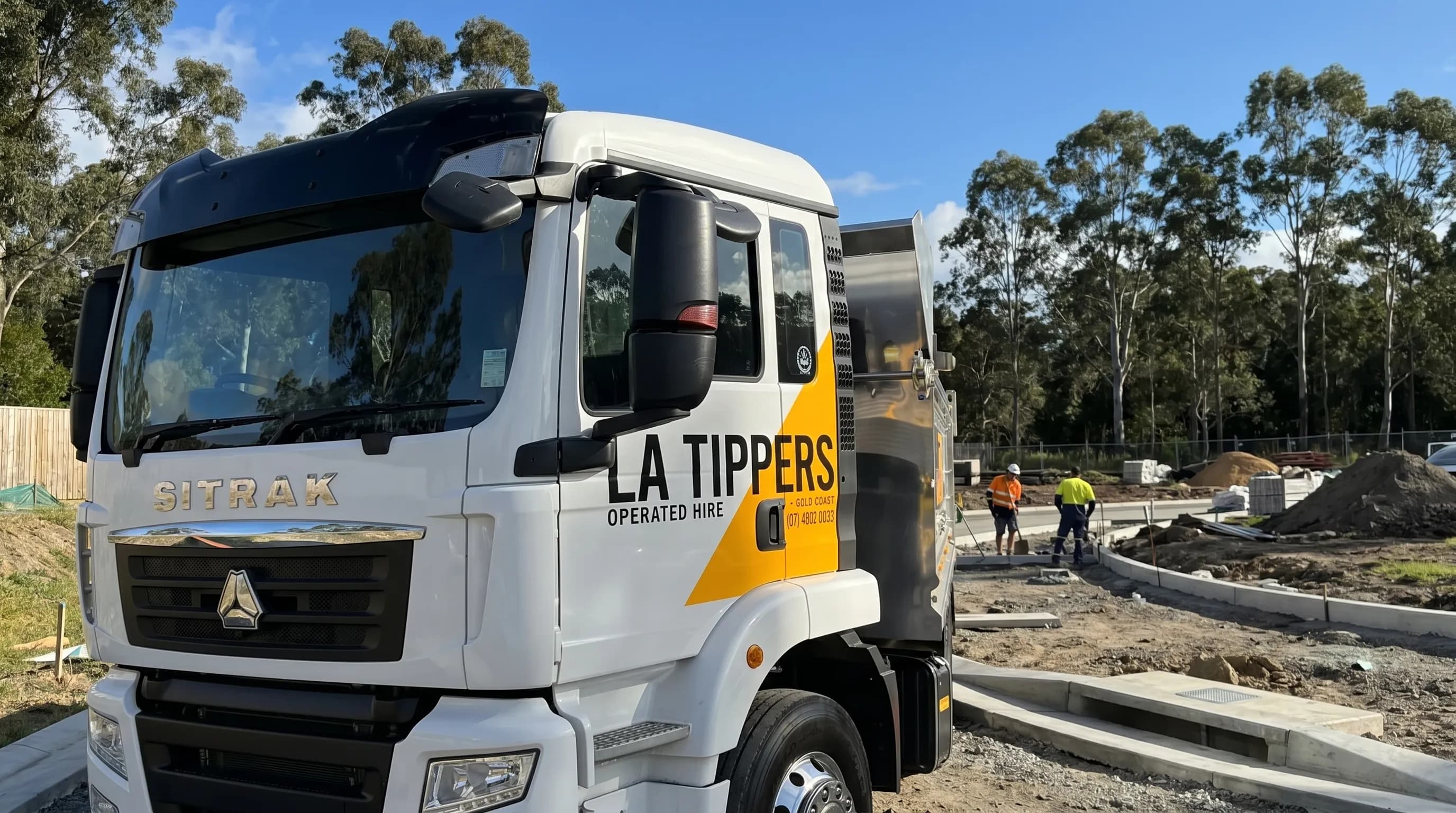 Tipper truck on a mid-Gold-Coast Robina civil works site