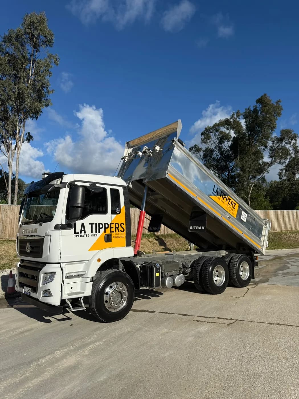 LA Tippers tipper truck discharging with tray raised